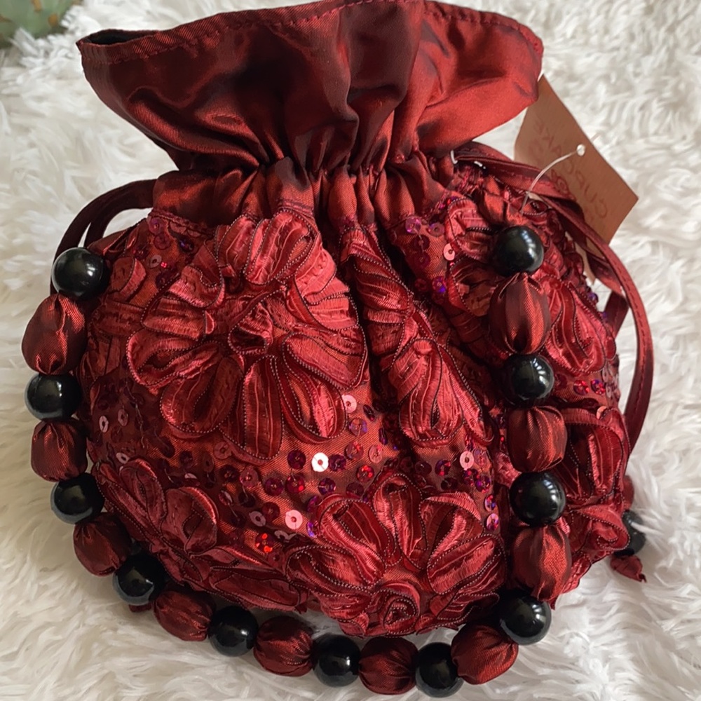Cupcake Red-wine satin embroidered and sequin drawstring wristlet bag.